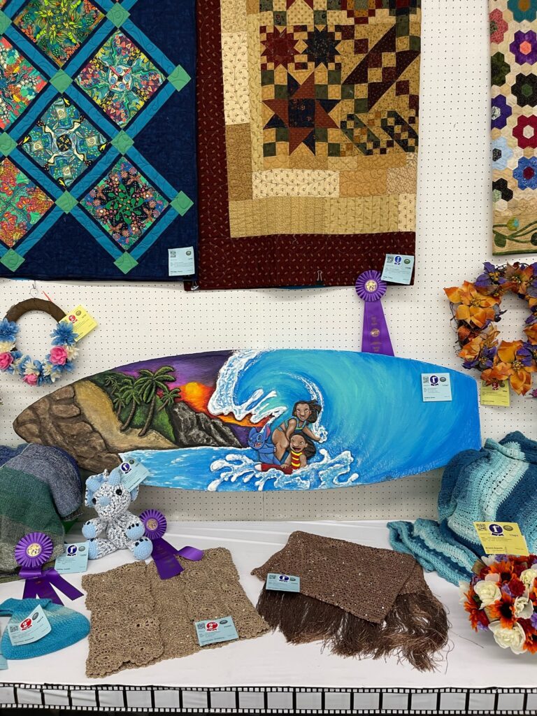 exhibits - Lilo & Stitch surf board, quilts